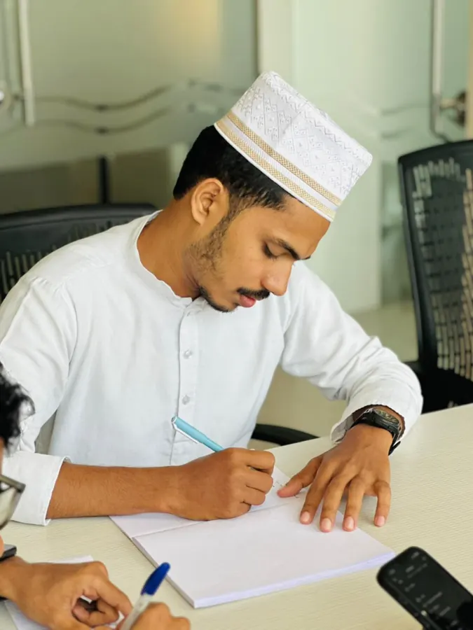 Student doing written practice in the Foundation Course